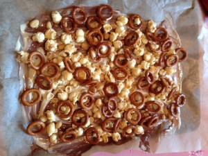 Popcorn, peanuts and pretzels sprinkled